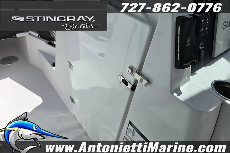Slide: The Image of 2026 Stingray 259DC boat interior with logo and contact details. - 41