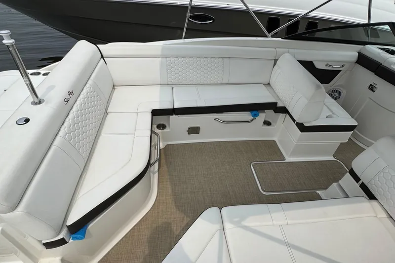 Slide: The Image of Luxurious seating area on a 2018 Sea Ray SDX 270 Outboard boat. - 10