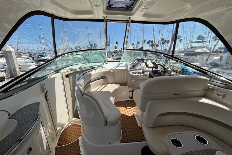 Slide: The Image of 2007 Chaparral Signature 350 yacht interior with luxurious seating and modern dashboard. - 2