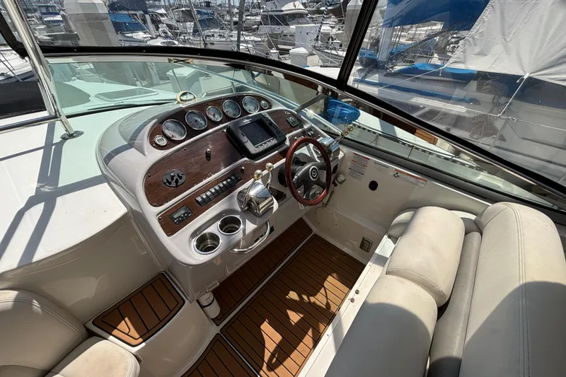 Slide: The Image of 2007 Chaparral Signature 350 boat helm with gauges, steering wheel, and controls. - 3