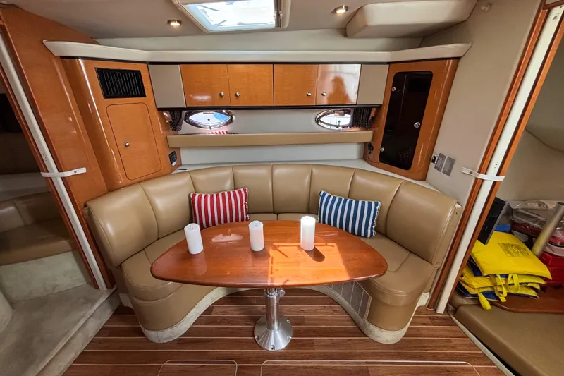 Slide: The Image of 2007 Chaparral Signature 350 yacht interior with cozy seating and stylish decor. - 5