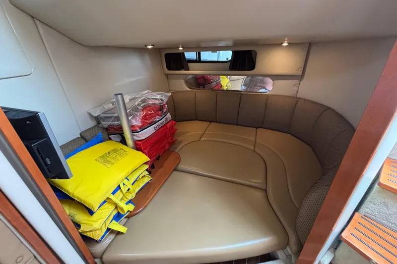 Slide: The Image of 2007 Chaparral Signature 350 cabin interior with seating and life jackets. - 7