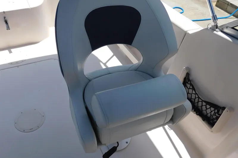 Slide: The Image of Captain's chair on 2008 Grady-White Tournament 205 boat, featuring sleek design and comfort. - 11