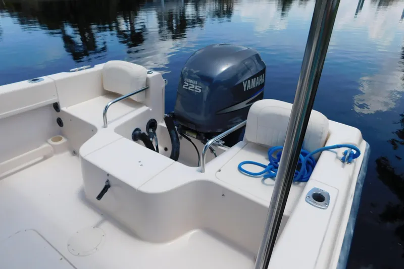Slide: The Image of 2008 Grady-White Tournament 205 boat with Yamaha 225 engine on calm water. - 14