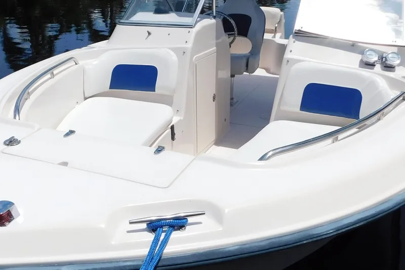Slide: The Image of 2008 Grady-White Tournament 205 boat interior with seating and steering console. - 7