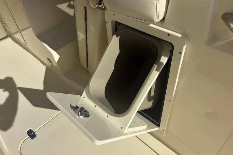 Slide: The Image of Storage compartment on 2026 Scout 255 Dorado boat, featuring sleek design and functionality. - 19