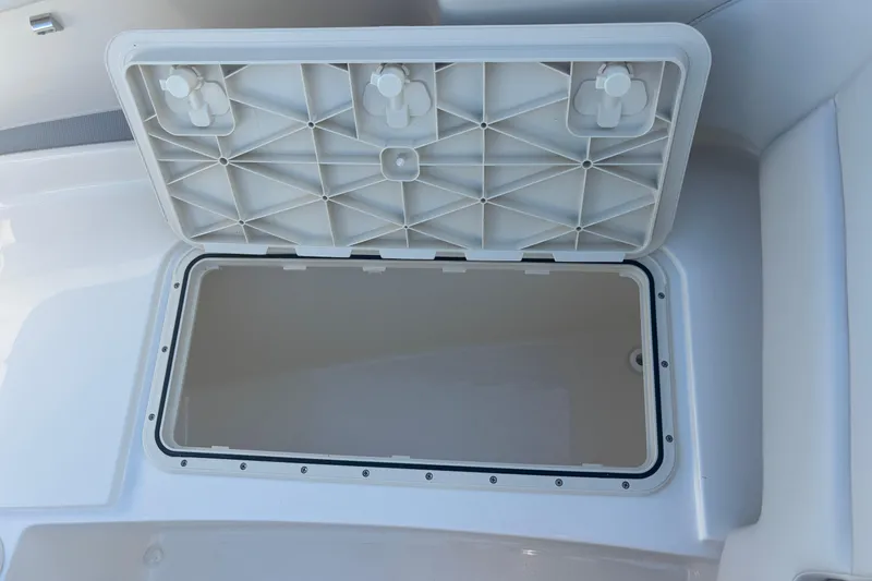 Slide: The Image of Open storage compartment on 2026 Scout 255 Dorado boat, showcasing interior space. - 29