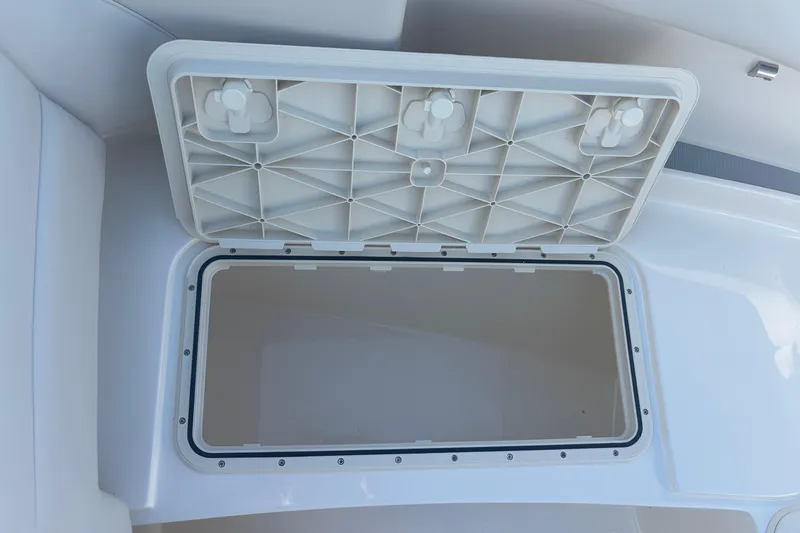 Slide: The Image of Open storage compartment on 2026 Scout 255 Dorado boat, showcasing interior space. - 30