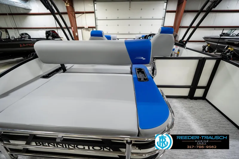 Slide: The Image of 2026 Bennington 21 SSB pontoon boat interior with modern dashboard and seating. - 18