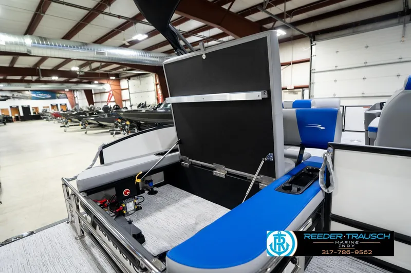 Slide: The Image of 2026 Bennington 21 SSB boat dashboard with steering wheel and digital display. - 28