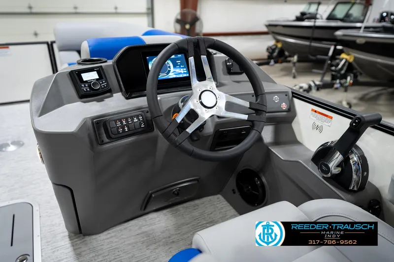 Slide: The Image of Close-up of 2026 Bennington 21 SSB steering wheel with Reeder-Trausch Marine logo. - 30