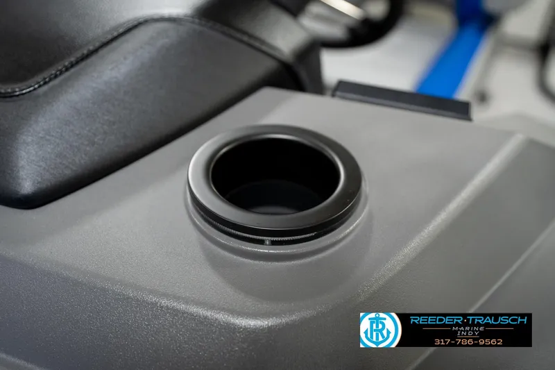 Slide: The Image of 2026 Bennington 21 SSB boat interior with cup holders and quilted seating. - 43