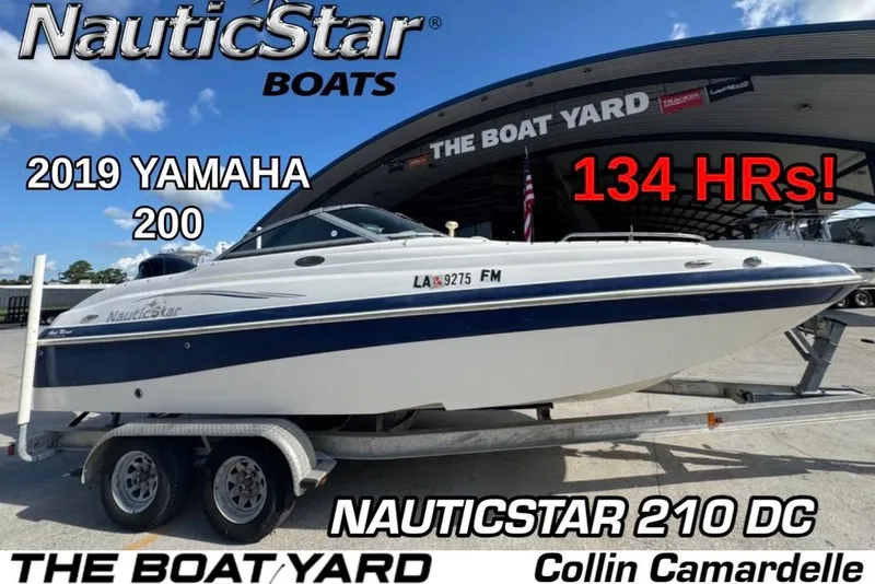 The Image of NauticStar 210 DC Sport Deck boat on trailer, 2019 Yamaha engine, 134 hours. - 1