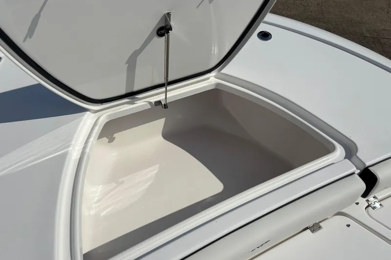 Slide: The Image of 2026 Tidewater 2500 Carolina Bay boat with Yamaha engines and comfortable seating. - 10