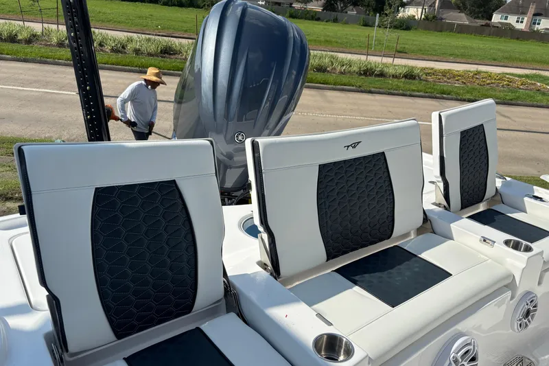 Slide: The Image of 2026 Tidewater 2500 Carolina Bay boat interior with Garmin navigation system. - 4