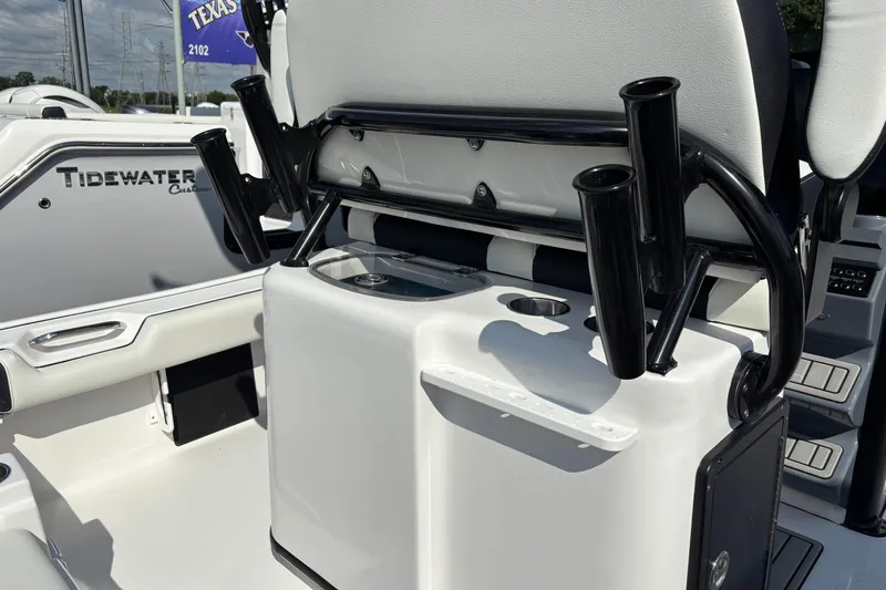 Slide: The Image of 2026 Tidewater 2500 Carolina Bay boat seats with stylish black and white design, outdoor setting. - 5
