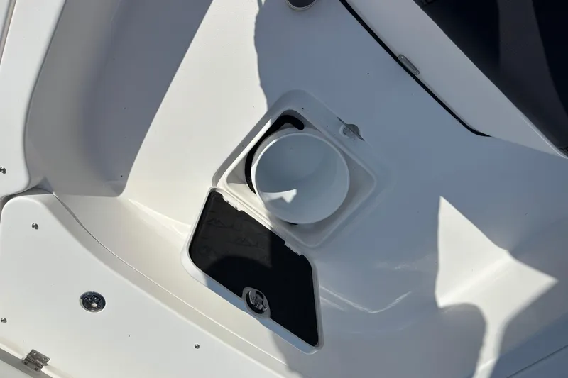Slide: The Image of Open storage compartment on 2026 Tidewater 2500 Carolina Bay boat. - 9