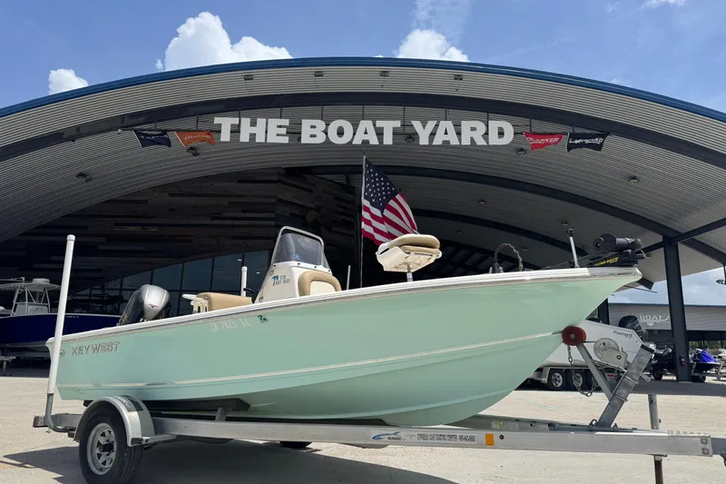 Slide: The Image of 2018 Key West 176 Bay Reef boat on trailer at The Boat Yard. - 1