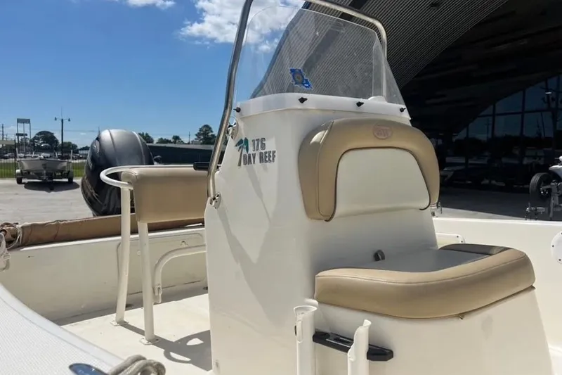 Slide: The Image of 2018 Key West 176 Bay Reef boat interior with seating and console. - 7