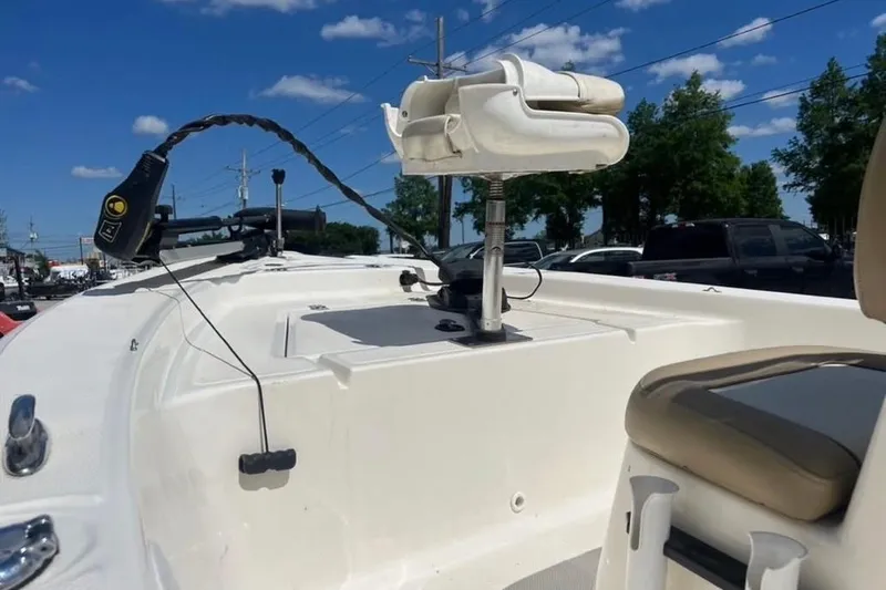 Slide: The Image of 2018 Key West 176 Bay Reef boat deck with seating and equipment under blue sky. - 9
