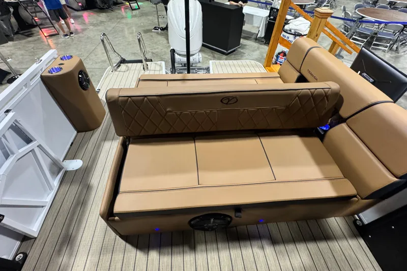 Slide: The Image of 2026 Veranda VX265DCVL boat interior with tan seating and modern design. - 12
