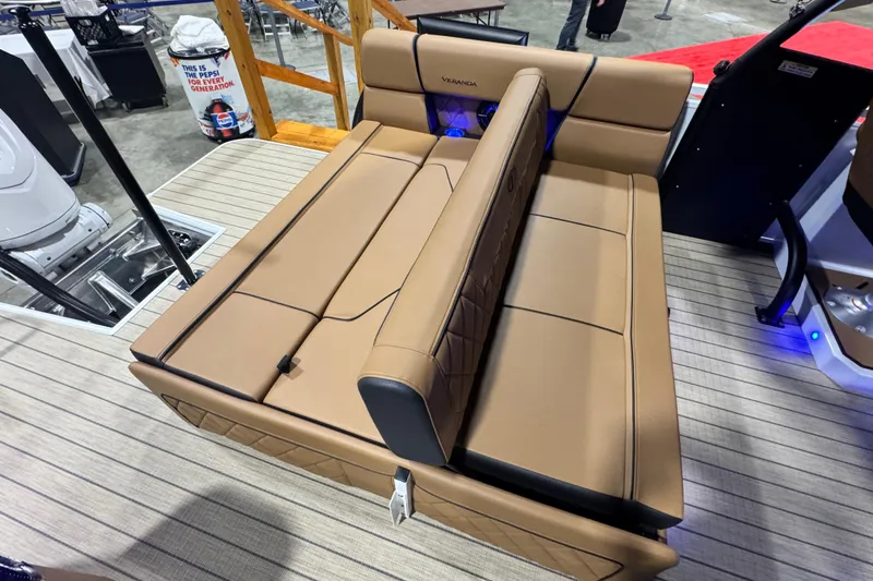 Slide: The Image of Luxurious seating on 2026 Veranda VX265DCVL boat, featuring tan upholstery and modern design. - 13