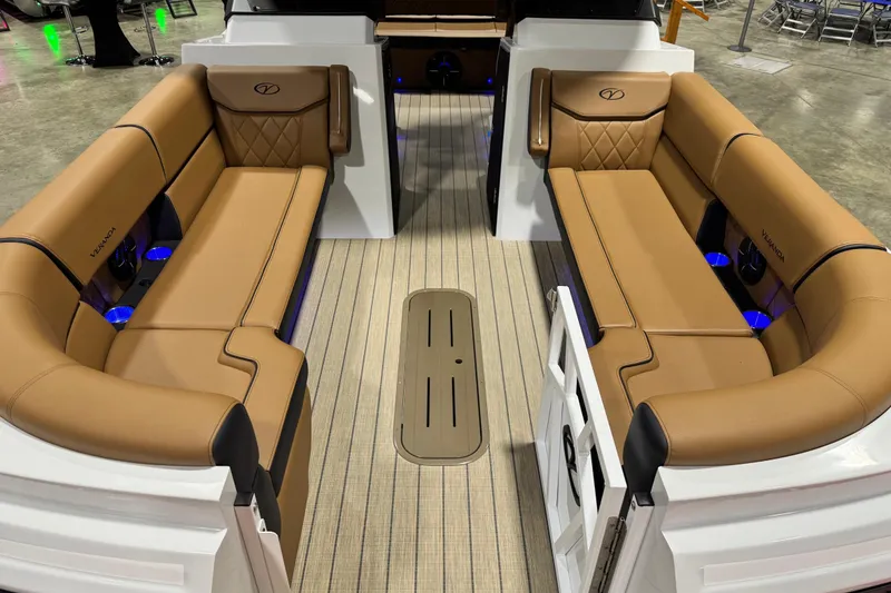 Slide: The Image of Luxurious interior of 2026 Veranda VX265DCVL boat with tan seating and blue lighting. - 5