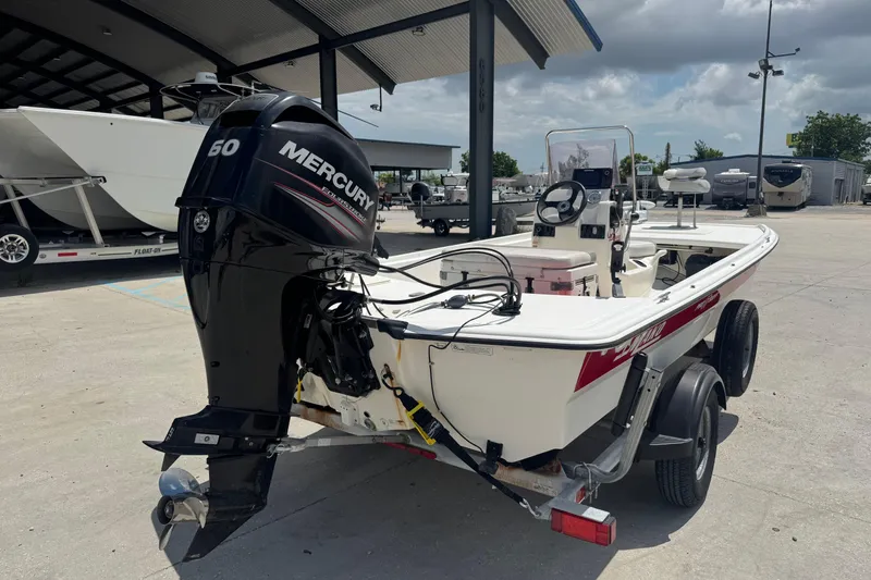 Slide: The Image of 2018 Mako Pro Skiff 17 CC with Mercury 60 engine on trailer. - 4