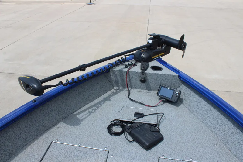 Slide: The Image of 2016 Tracker Pro Guide V-16 WT boat with trolling motor and fish finder. - 13