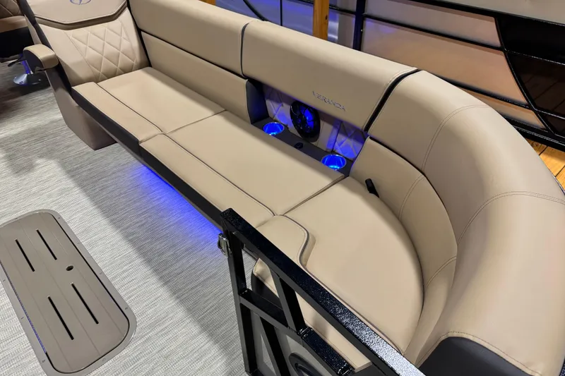 Slide: The Image of Luxurious seating in 2026 Veranda VX25RC boat with ambient blue lighting. - 3