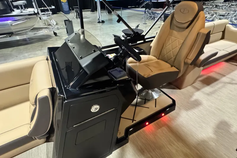 Slide: The Image of 2026 Veranda VX25RC boat interior with luxurious seating and modern dashboard. - 6