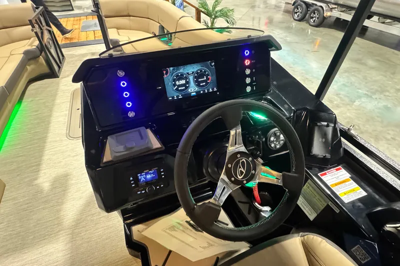 Slide: The Image of 2026 Veranda VX25RC boat dashboard with modern controls and digital display. - 7