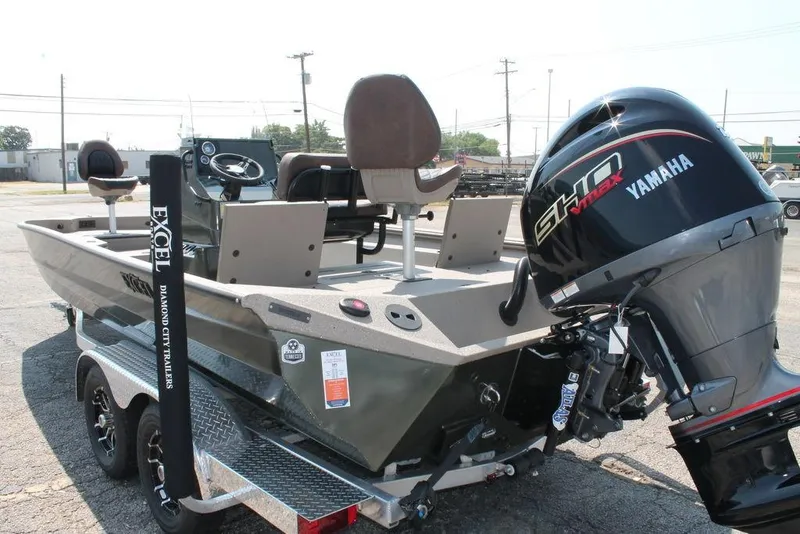 Slide: The Image of 2026 Excel Bay Pro Elite 220 boat with Yamaha engine on trailer. - 5