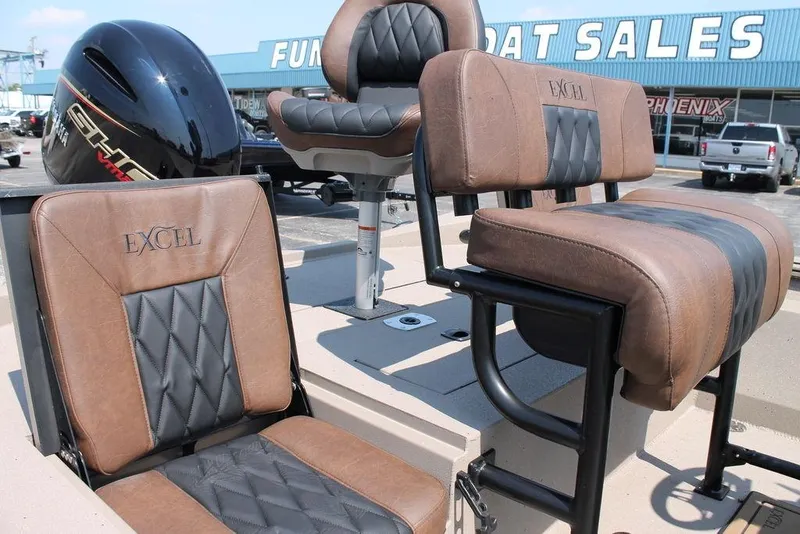 Slide: The Image of 2026 Excel Bay Pro Elite 220 boat seats at dealership, showcasing premium leather design. - 9
