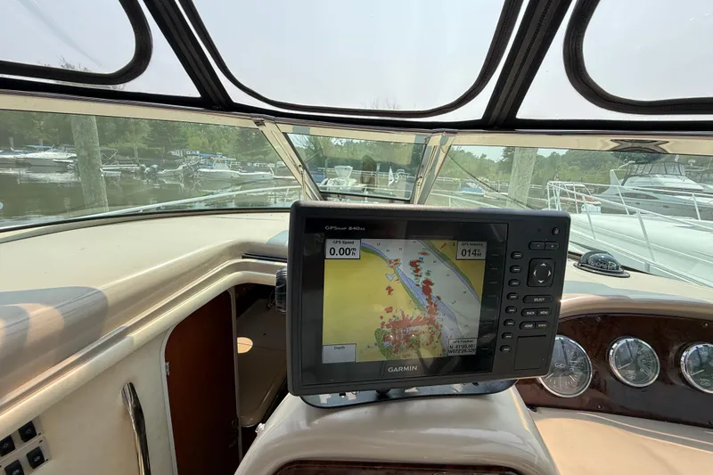 Slide: The Image of 2003 Sea Ray 340 Sundancer cockpit with Garmin GPS navigation system. - 20