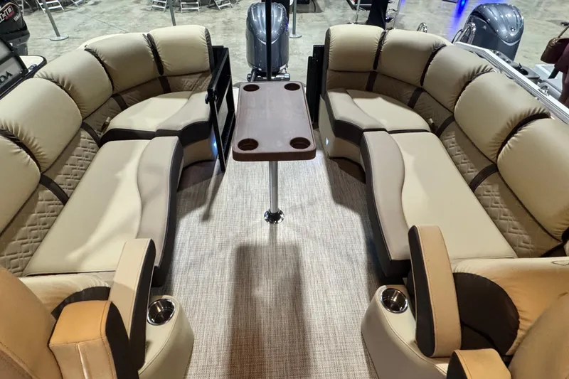 Slide: The Image of Luxurious interior of 2026 Veranda Relax VR22RC pontoon boat with plush seating and table. - 9