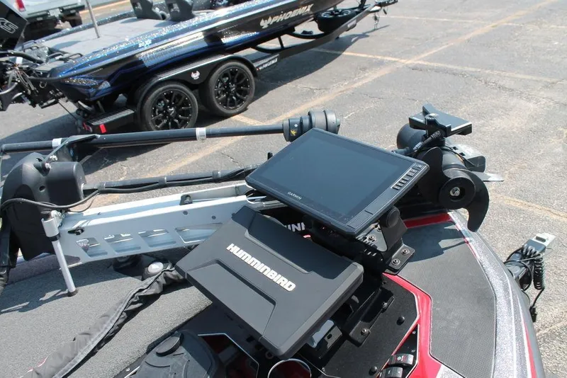 Slide: The Image of 2022 Skeeter FXR21 Apex boat with Humminbird electronics and Garmin display on deck. - 11