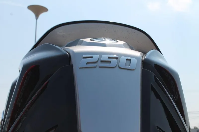 Slide: The Image of 2022 Skeeter FXR21 Apex boat engine with "250" emblem, close-up view. - 6