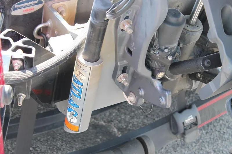 Slide: The Image of Close-up of 2022 Skeeter FXR21 Apex boat engine components and hydraulic system. - 7