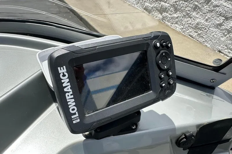 Slide: The Image of Lowrance fish finder on 2019 Tracker Pro Guide V-16 WT boat dashboard. - 21