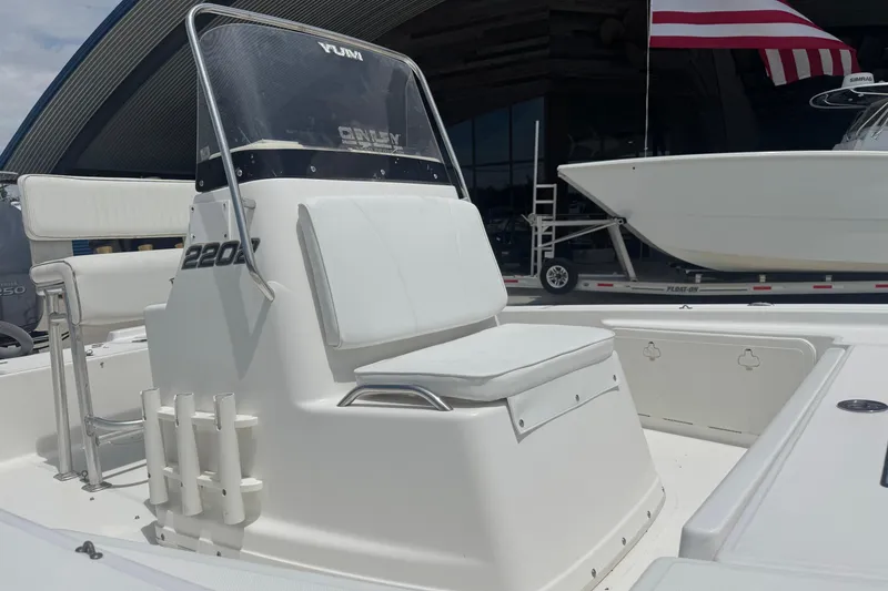 Slide: The Image of 2008 Century 2202 BAY boat with Yamaha 250 engine, docked outdoors. - 13