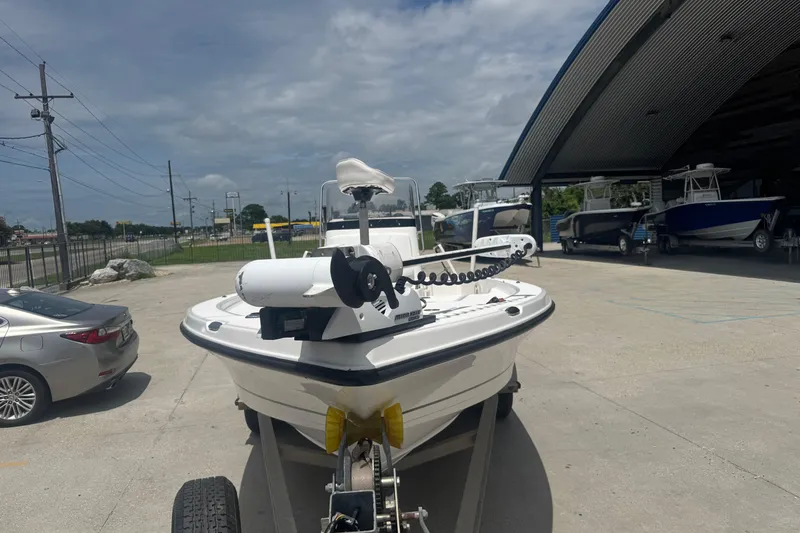 Slide: The Image of 2008 Century 2202 BAY boat with powerful outboard motor in parking lot. - 4
