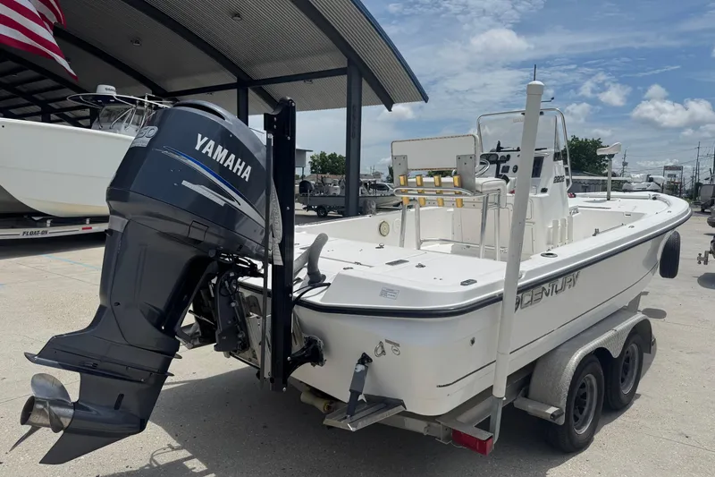 Slide: The Image of 2008 Century 2202 BAY boat console with steering wheel and control panel. - 7