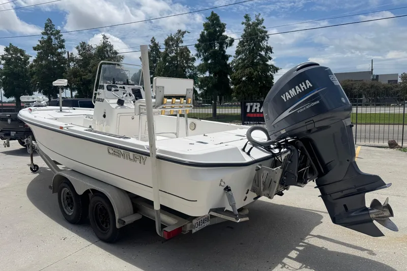 Slide: The Image of 2008 Century 2202 BAY boat with Yamaha 250 engine, featuring white seating and deck. - 8