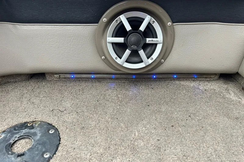 Slide: The Image of Speaker system with blue LED lights in a 2010 Premier 250 S-Series boat. - 23