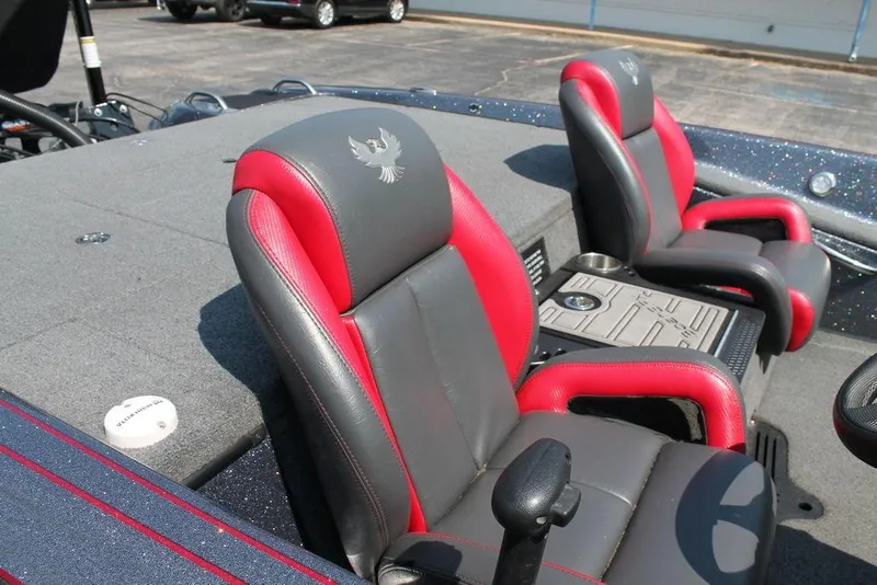Slide: The Image of 2022 Phoenix 721 Pro XP boat interior with red and gray seats. - 4