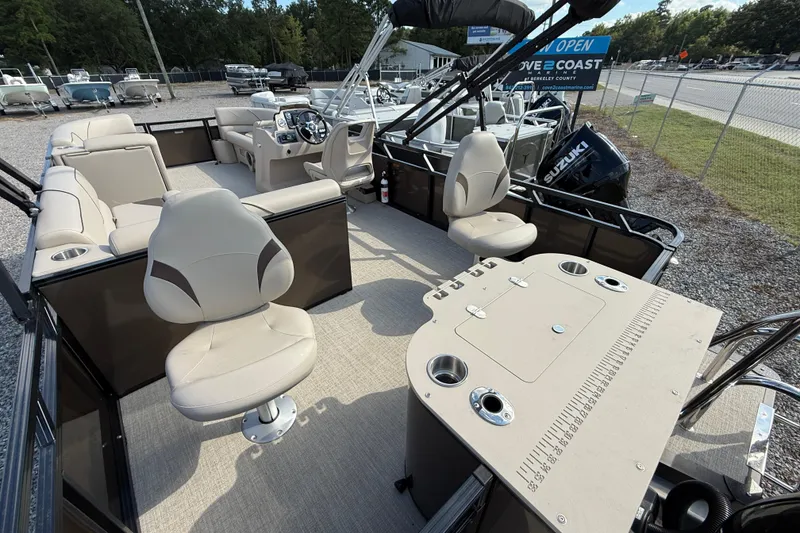 Slide: The Image of 2025 Tahoe Pontoon Sport 85 Rear Fish with spacious seating and fishing amenities. - 2