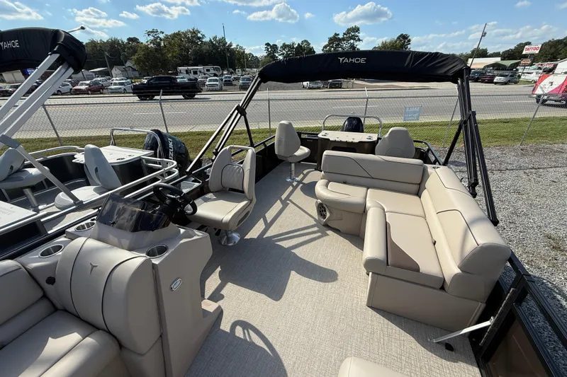 Slide: The Image of 2025 Tahoe Pontoon Sport 85 Rear Fish with beige seating and modern design. - 4