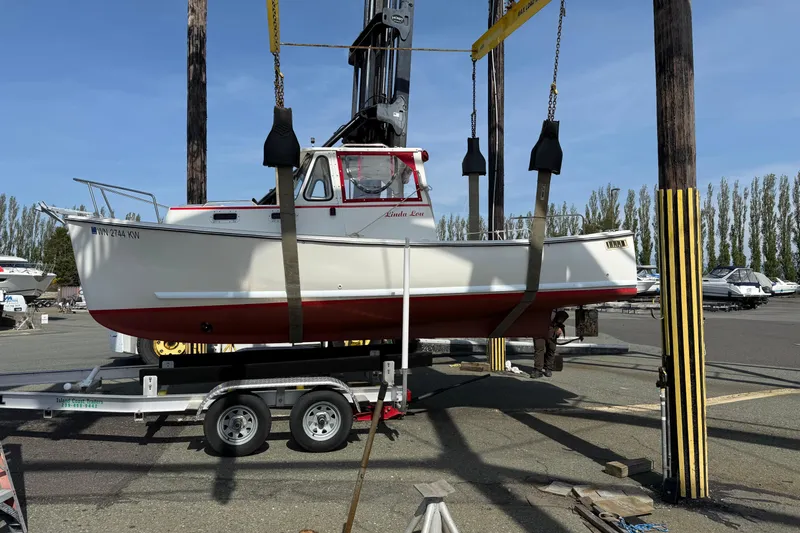 Slide: The Image of 2013 Atlas Boat Works Pompano 21 on trailer at marina, ready for launch. - 5