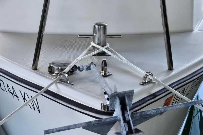 Slide: The Image of 2013 Atlas Boat Works Pompano 21 bow with anchor and mooring lines. - 9